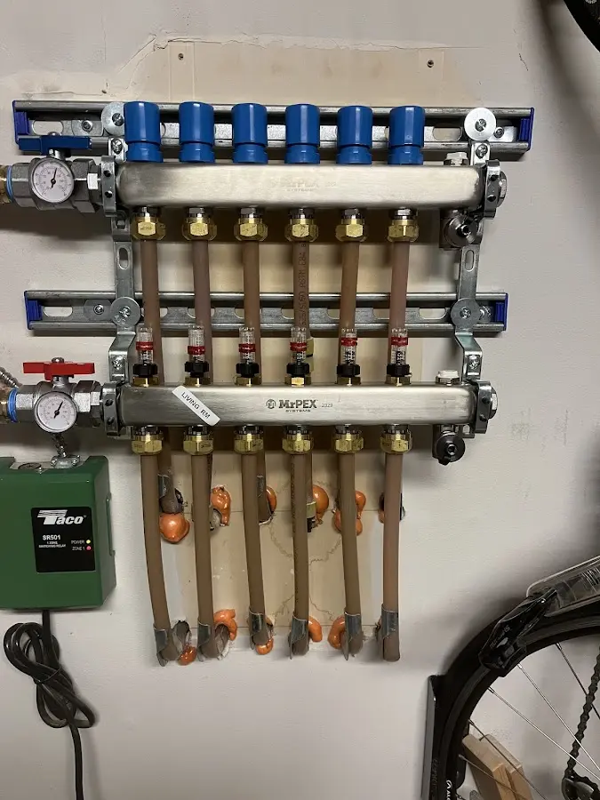 Plumber performing Leak Detection at a residential property in New Fairfield